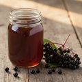 Elderberry Infused Honey in a Mason Jar